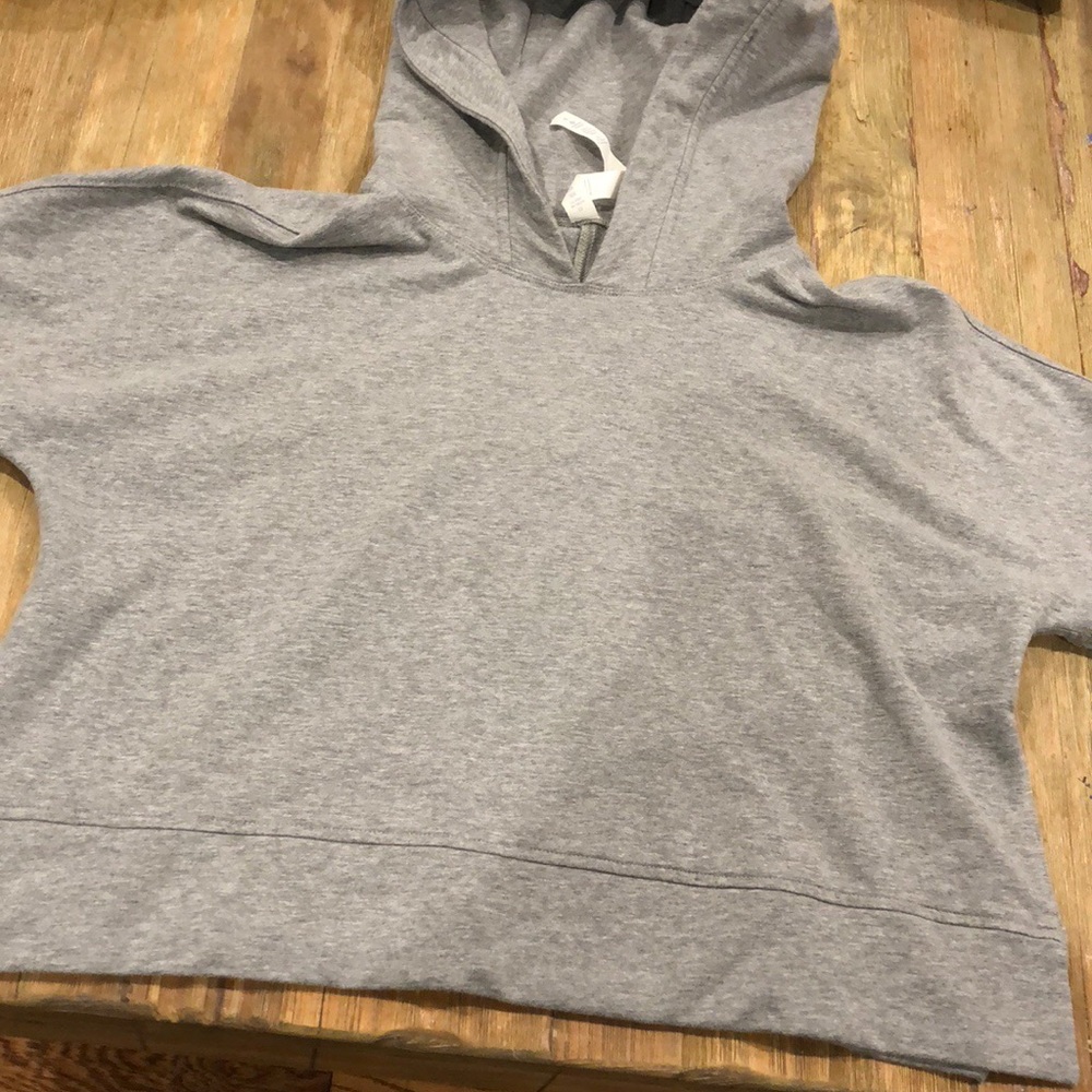 Light gray cropped Lululemon workout sweatshirt